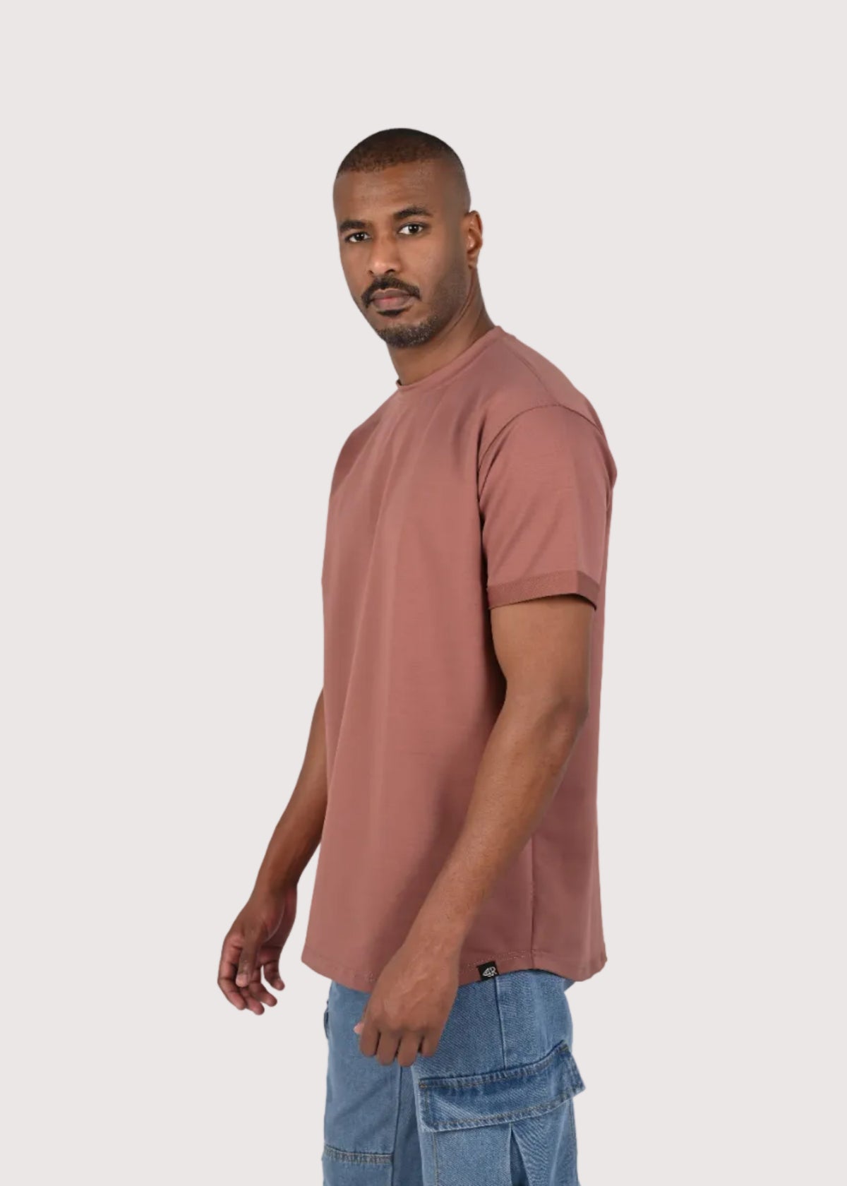 Desert Mauve Eternal relaxed fit t-shirt for men, side view – Rewind Apparel Dubai