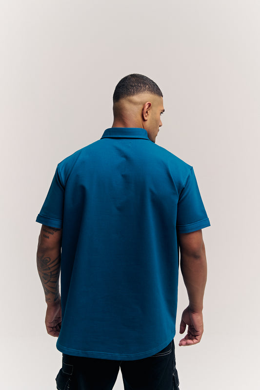 Pacific Blue Eternal relaxed fit polo t-shirt for men, back view – Rewind Apparel Dubai