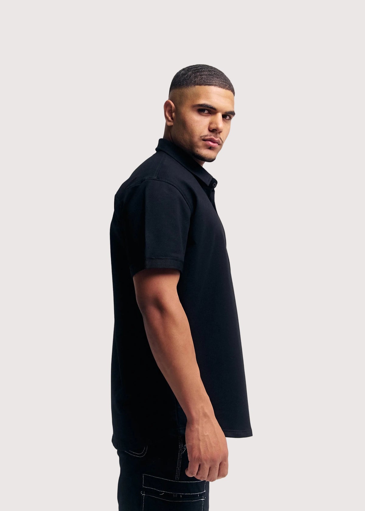 Black Prime relaxed fit button-up shirt for men, side view – Rewind Apparel Dubai