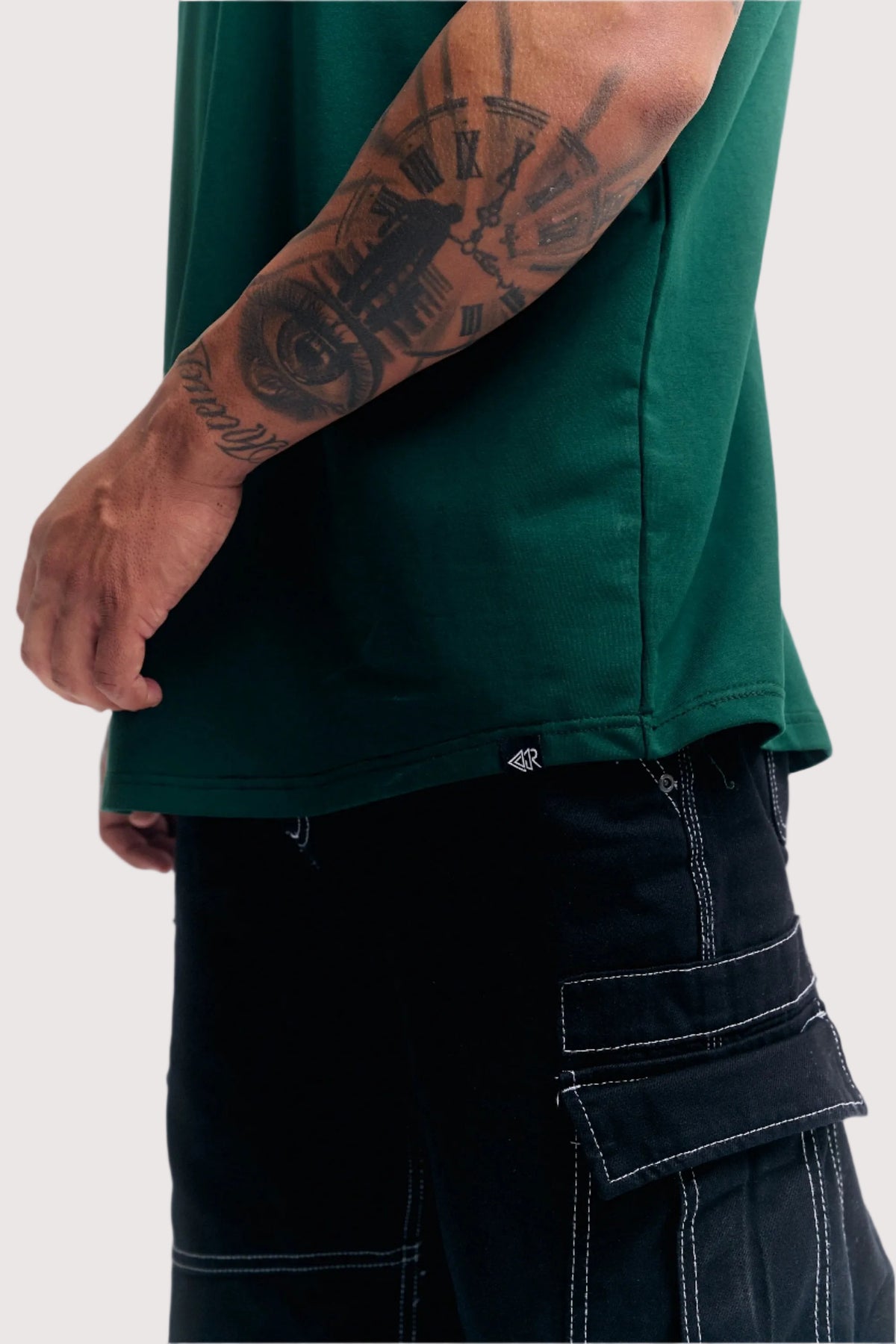 Royal Green Eternal relaxed fit t-shirt for men, hem and woven label close-up – Rewind Apparel Dubai