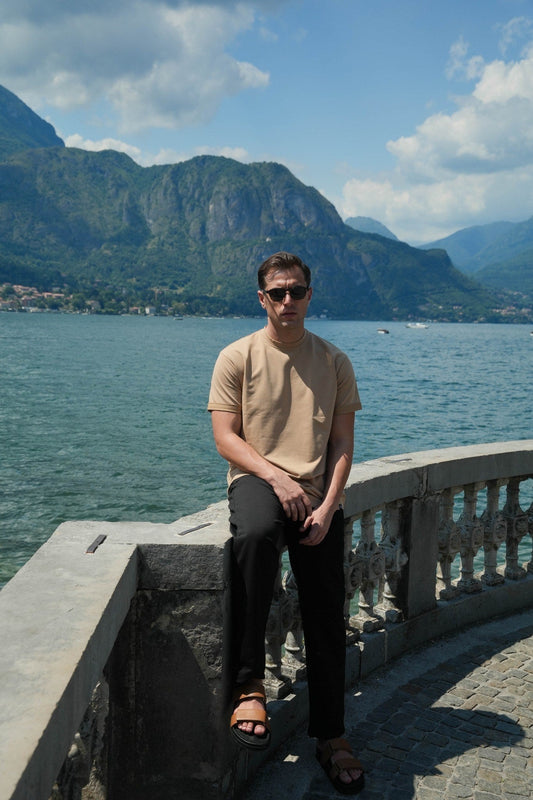 Man wearing Rewind Apparel at Lake Como, europe summer packing guide, travel lookbook