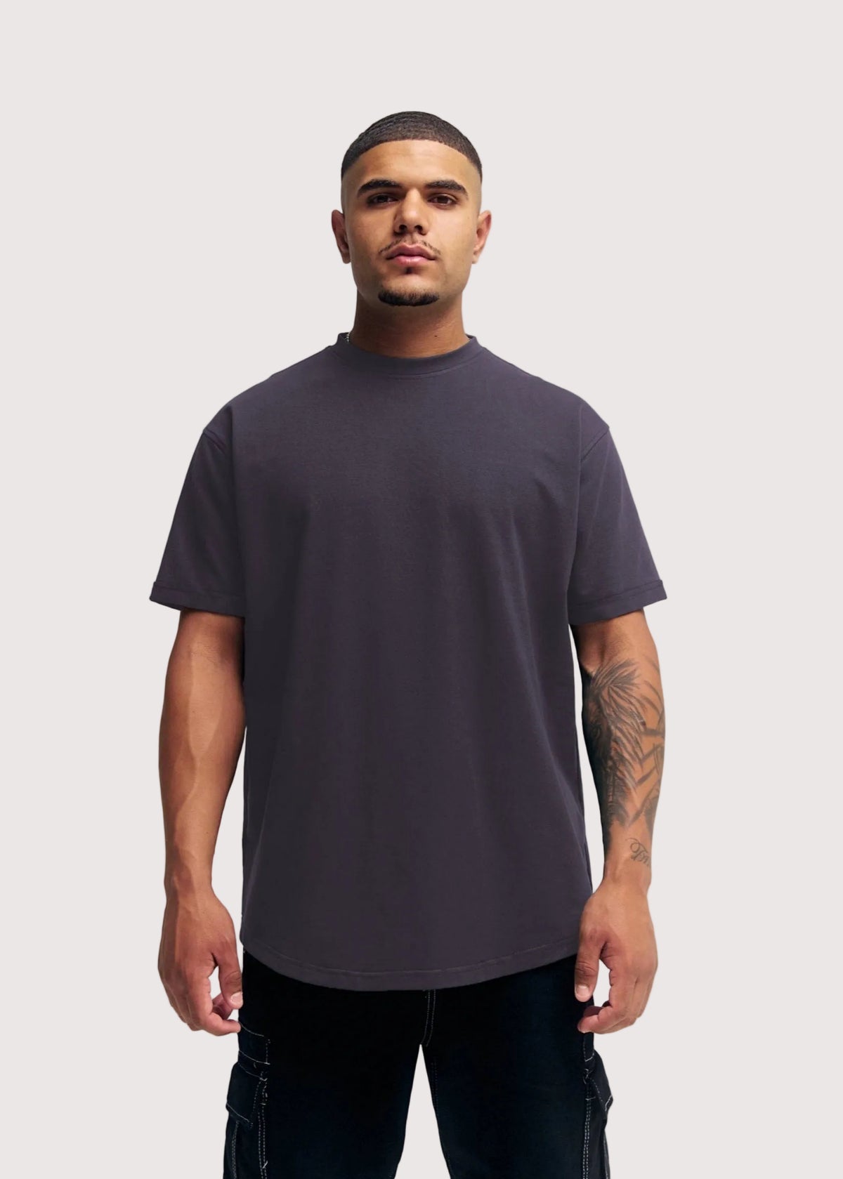 Dark Grey Eternal relaxed fit t-shirt for men, front view on model – Rewind Apparel Dubai