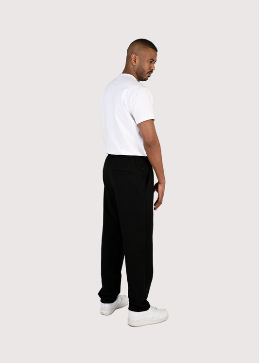 Eternal Como co-ord set for men, white tee with black trousers on model – Rewind Apparel Dubai