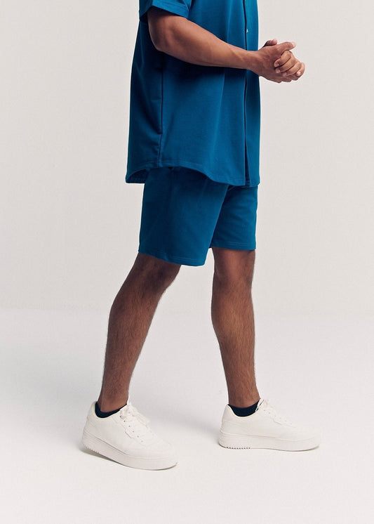 Pacific Blue Classix regular fit shorts for men, side view, legs – Rewind Apparel Dubai