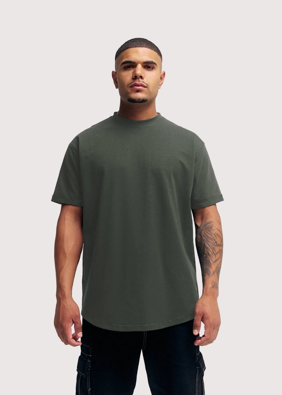 Navy Green Eternal relaxed fit t-shirt for men, front view on model – Rewind Apparel Dubai