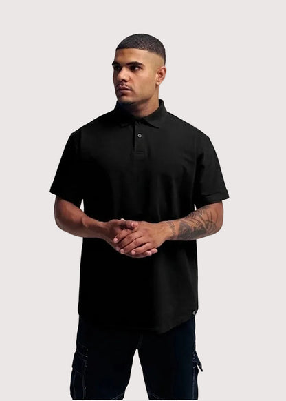 Black Eternal relaxed fit polo shirt for men, front view on model – Rewind Apparel Dubai
